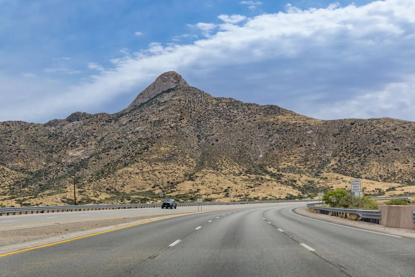 Desert highway and the Franklin Mountains in El Paso, Texas