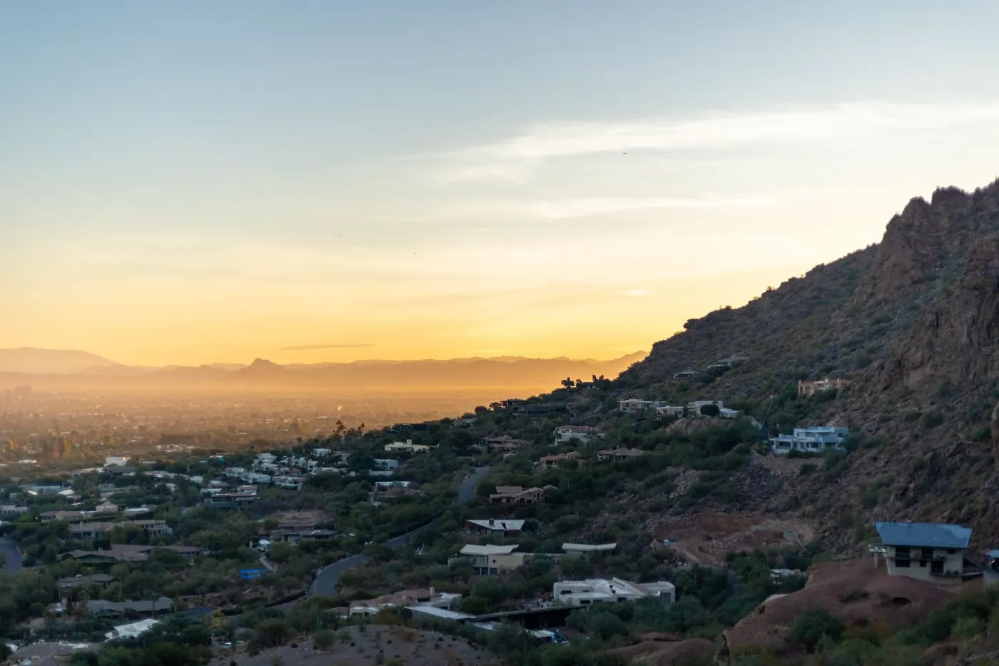 Phoenix, Arizona cityscape and desert hills at sunset